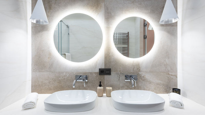 Applique murale salle de bain : volumes, IP et hauteur (guide 2026)