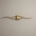 Applique murale salon LED, design moderne et simple - applique vague doree eteinte vue de face #or