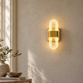 Applique murale chambre tête de lit LED, lumière chaude - v8 applique de chevet doree sur un mur clair #dore